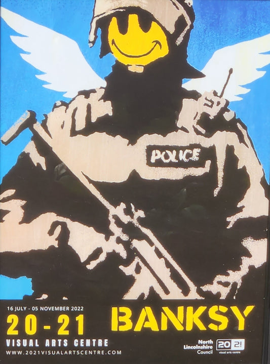 Banksy- Flying Copper